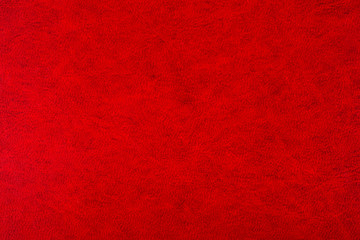 Red book cover close-up. Beautiful background for designers.
