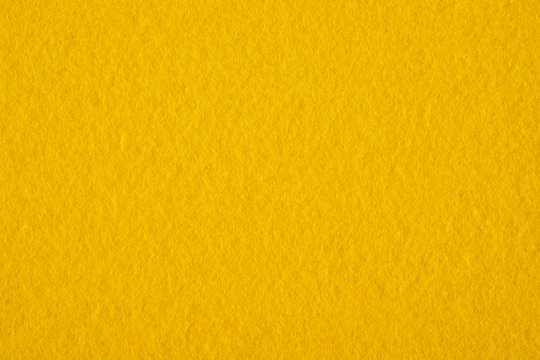 Yellow texture fabric close-up. Background for designers.