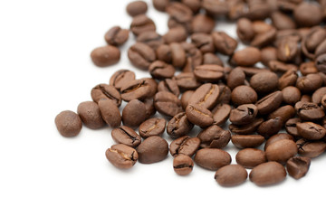 Close up shot of coffee beans on white background