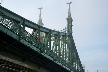 The Liberty Bridge in Budapest in Hungary, it connects Buda and Pest cities across the Danube river. shortest bridge in Budapest city.
