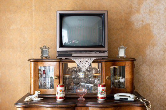 Old fashioned interior - vintage television set on stand