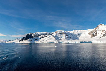 Fototapeta na wymiar Antarctic landscape with iceberg at sea