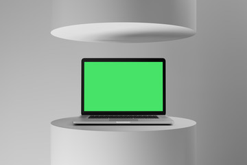 Laptop mockup with isolated screen in abstract scene. Clipping path included. 3D Render