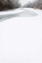 Fototapeta na wymiar Snow on the the Drava River