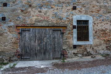 old house facade with garage door