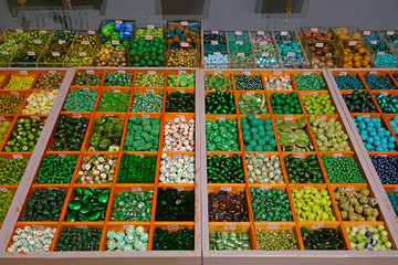 Colorful beads for sale at a craft store in France