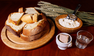 Ingredients of making bread on wooden table