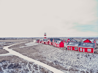 Scenic view of colorful wooden buildings top view. Fishing village and tourist town. Wooden red...