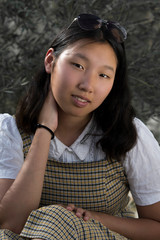 Beautiful Asian teenage female with smile. Natural beauty concept. Mongolian young girl. 