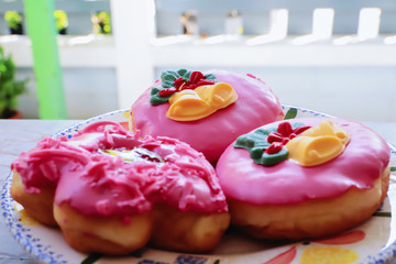 Fancy donuts on a white plate