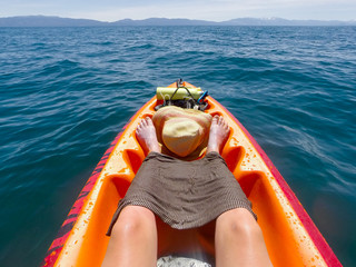 Shirt Draped Over Legs To Protect from Sun in a Kayak on Lake Tahoe, California