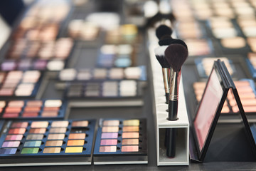Bright multi-colored eye shadow. Professional makeup for make-up artists