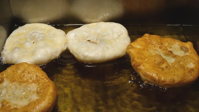 Langos - Hungarian food speciality, a deep fried dough