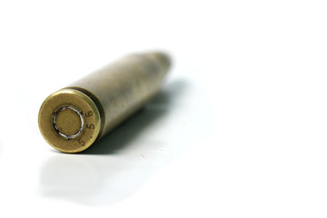 macro shoot of 5.56 caliber bullet on a white isolated background