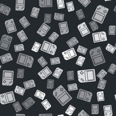Grey Portable video game console icon isolated seamless pattern on black background. Gamepad sign. Gaming concept. Vector Illustration © vector_v