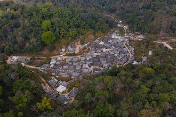 Fototapeta na wymiar Aerial view of the remote Nuogang Dai village in Lancang, Yunnan - China
