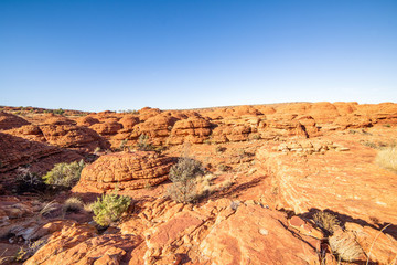 Lookout over the canyon of red arid earth