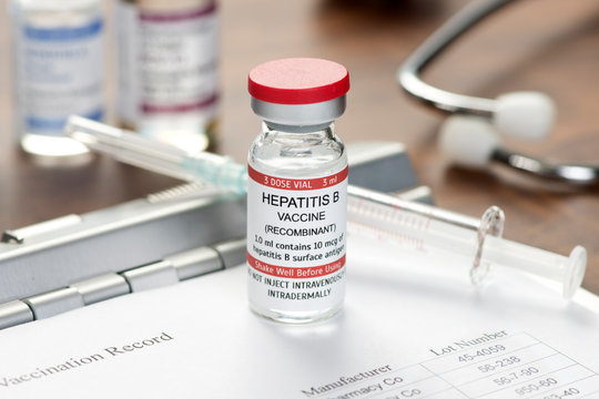 Hepatitis B Vaccine Vial On Desk