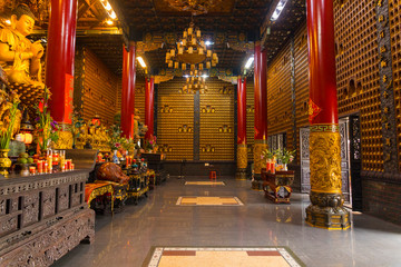 Fototapeta na wymiar Beautiful golden buddha in Thousand Buddha Temple or Chua Van Phat temple in Ho Chi Minh City, Vietnam