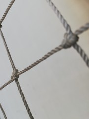 fragment of cells of a rope grid with knots 