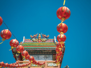 Sky blue Close to the Chinese New Year Asian cultural descent churches and temple Including red lanterns to decorate with Chinese write meaning good luck wealth money throughout the year as a greeting