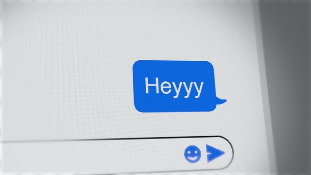 Text message or SMS "Heyyy" received or written on mobile screen or computer
