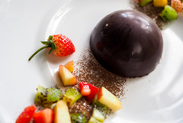 fresh fruits and chocolate in cafe
