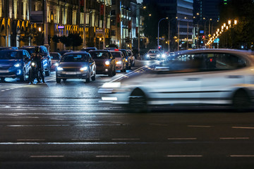 car traffic at night on the street. illuminated cityscape night view