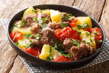 Armenian and Georgian Khashlama stew of meat with vegetables close-up in a bowl. horizontal
