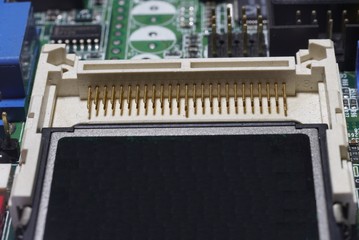 A CF socket cards on a computter board.