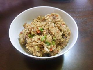 Thai food style, Grilled mackerel chili paste in white bowl on wooden table as a background, This food is most popular Thai food, Nam prik pla tu is Thai traditional
