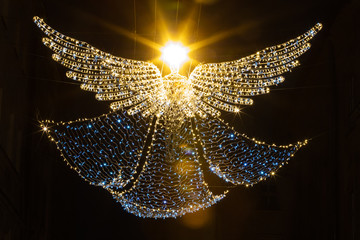 Christmas lighted decoration of angel hanging on Lviv street