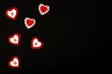 Valentine's day red hearts on a black background