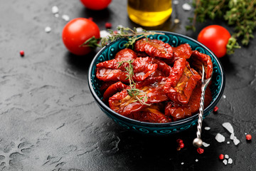 Sun dried tomatoes with fresh herbs and spices. 