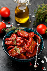 Sun dried tomatoes with fresh herbs and spices. 
