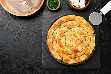 Traditional feta cheese phyllo pastry pie. top view