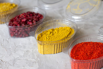 delicious and flavorful spices for food. lots of seasonings in the bowls. additives for cooking. Georgian seasonings. the concept of cooking and foodies. the view from the top. space for text.