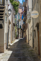 Typical street on the Old Town of Cefalu city on Sicily Island in Italy