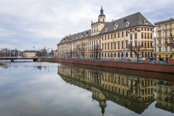 Obraz premium University of Wroclaw building on the bank of Oder river in historic part of Wroclaw, capital city of Lower Silesian Province, Poland