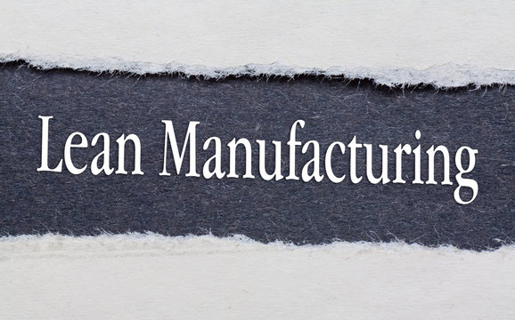 Lean Manufacturing words under torn black paper.