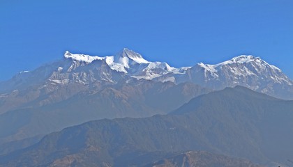 Annapurna in north central Nepal / White snow on top of Annapurna, a massif in the Himalayas in north-central Nepal.
