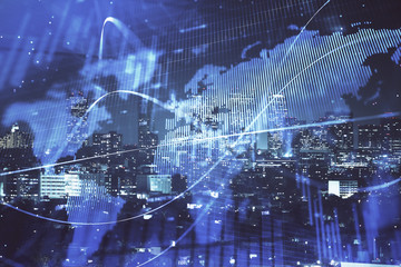 Financial graph on night city scape with tall buildings background multi exposure. Analysis concept.
