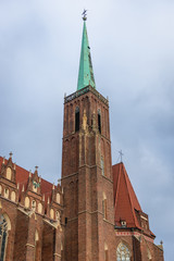 Fototapeta na wymiar Holy Cross and Saint Bartholomew Church in Ostrow Tumski - historic part of Wroclaw city, Poland