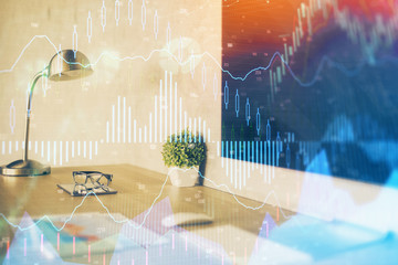 Forex market chart hologram and personal computer background. Double exposure. Concept of investment.