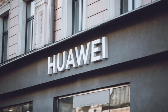 Huawei P30 Series ad in shop window. Shop sign Huawei. Kiev, Ukraine - September 02, 2019