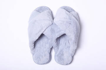 Women's slippers on a light background.
