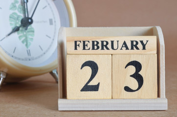 February 23, Cover design with clock in natural concept.