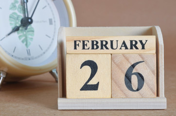 February 26, Cover design with clock in natural concept.