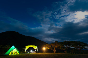 Fototapeta na wymiar Camp tents under the moonrise.