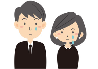 喪服を着た若い男女